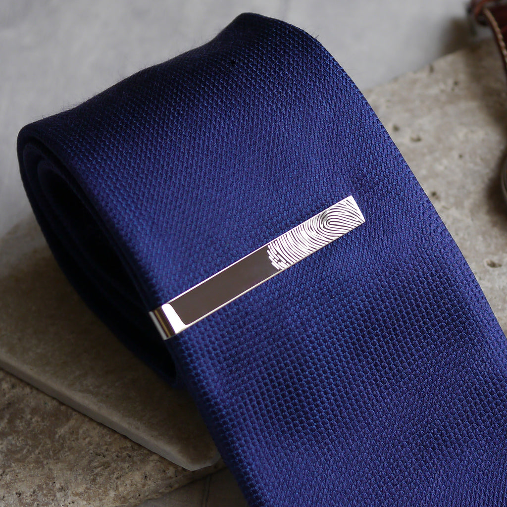 Fingerprint tie clip