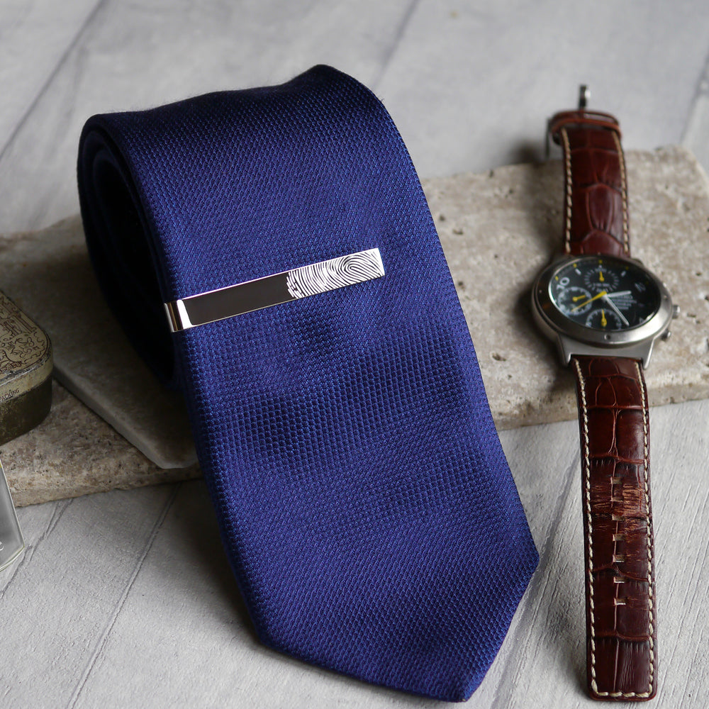 Fingerprint tie clip